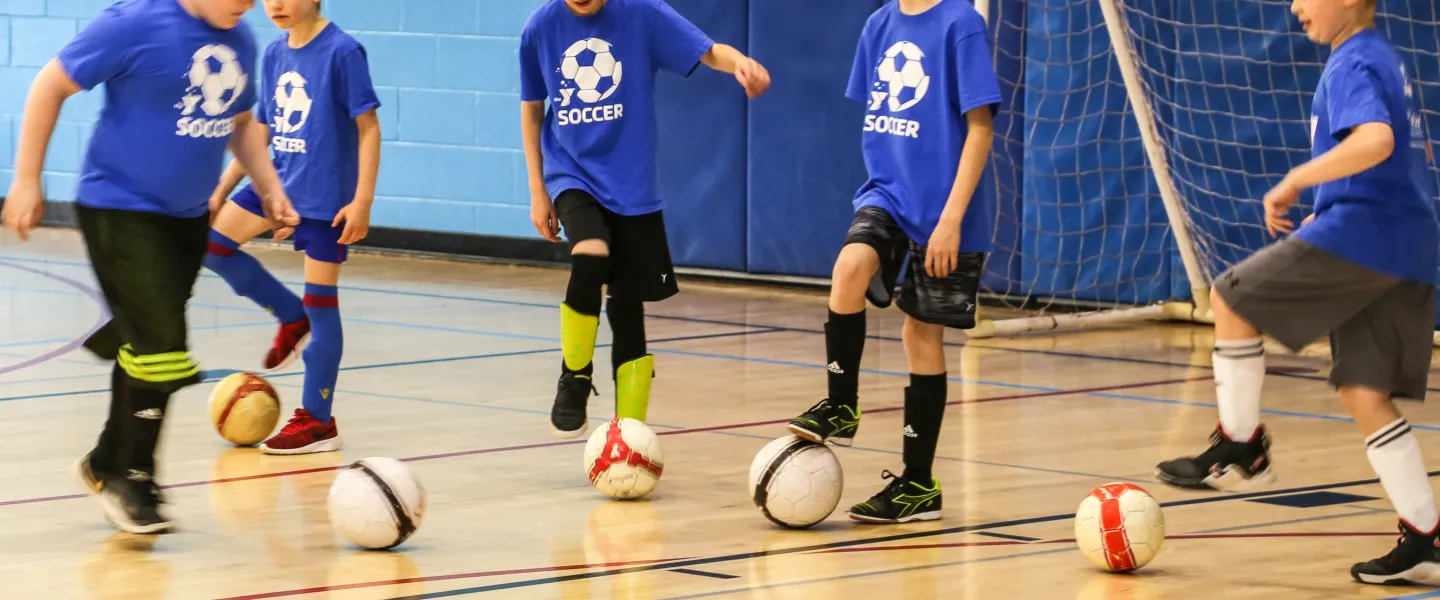kids playing indoor soccer