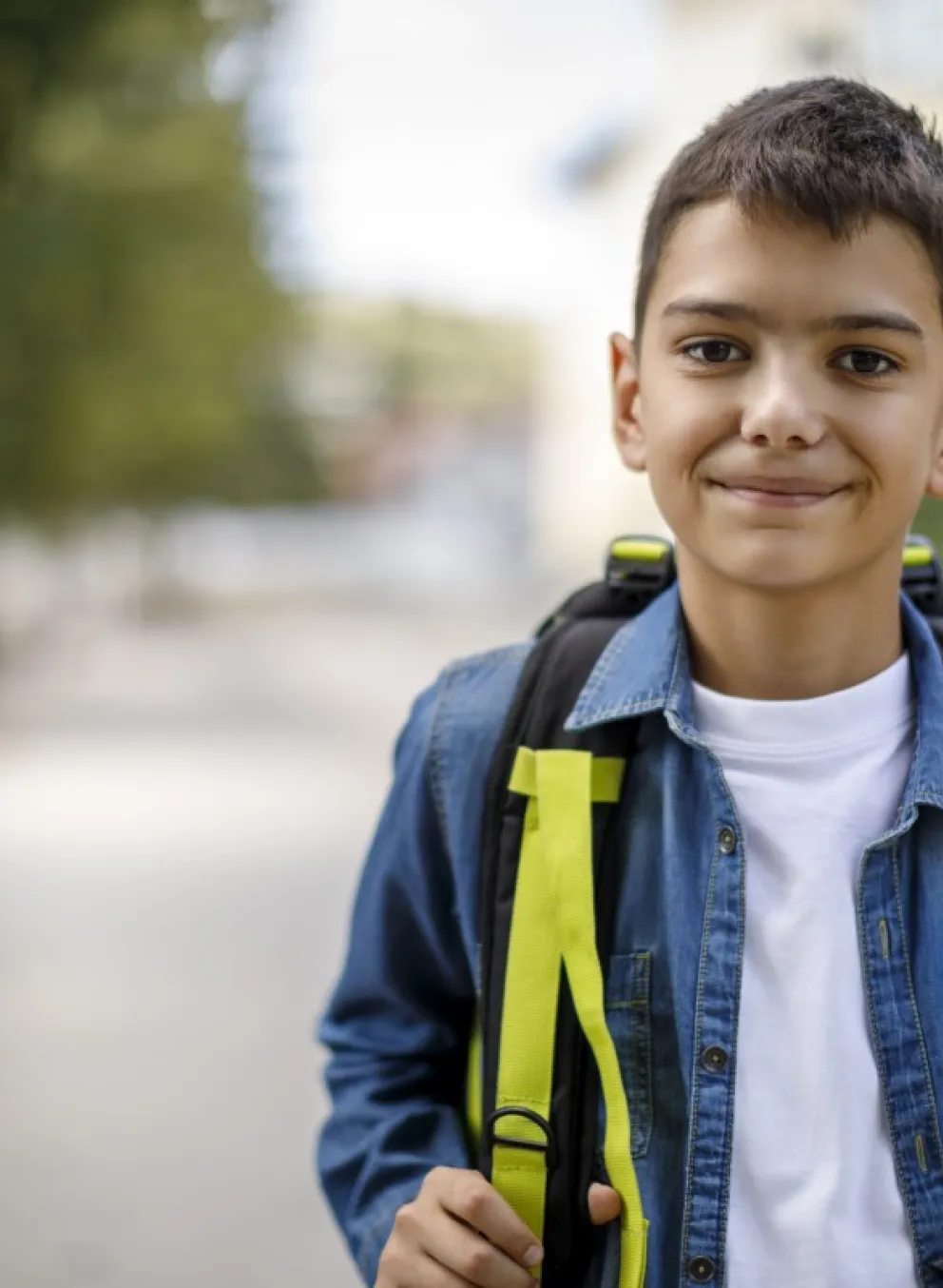 school age boy with backpack