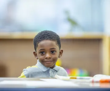 preschool child at desk